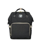 Grossaufnahme Wickelrucksack Uni in Schwarz. Alle Farben des Wickelrucksacks Uni. Das Design ist ähnlich zu Pomelo Best, Anello, Lekebaby, Queenya oder lequeen