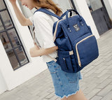 Wickelrucksack Uni über die Schulter getragen in blau