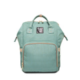 Grossaufnahme Wickelrucksack Uni in Mint Grün. Alle Farben des Wickelrucksacks Uni. Das Design ist ähnlich zu Pomelo Best, Anello, Lekebaby, Queenya oder lequeen