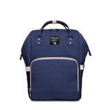 Grossaufnahme Wickelrucksack Uni in Blau. Alle Farben des Wickelrucksacks Uni. Das Design ist ähnlich zu Pomelo Best, Anello, Lekebaby, Queenya oder lequeen