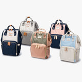 Alle Farben des Wickelrucksack POP von Dokoclub: Dunkel Blau, Rosa, Grau, Navy und Hellblau